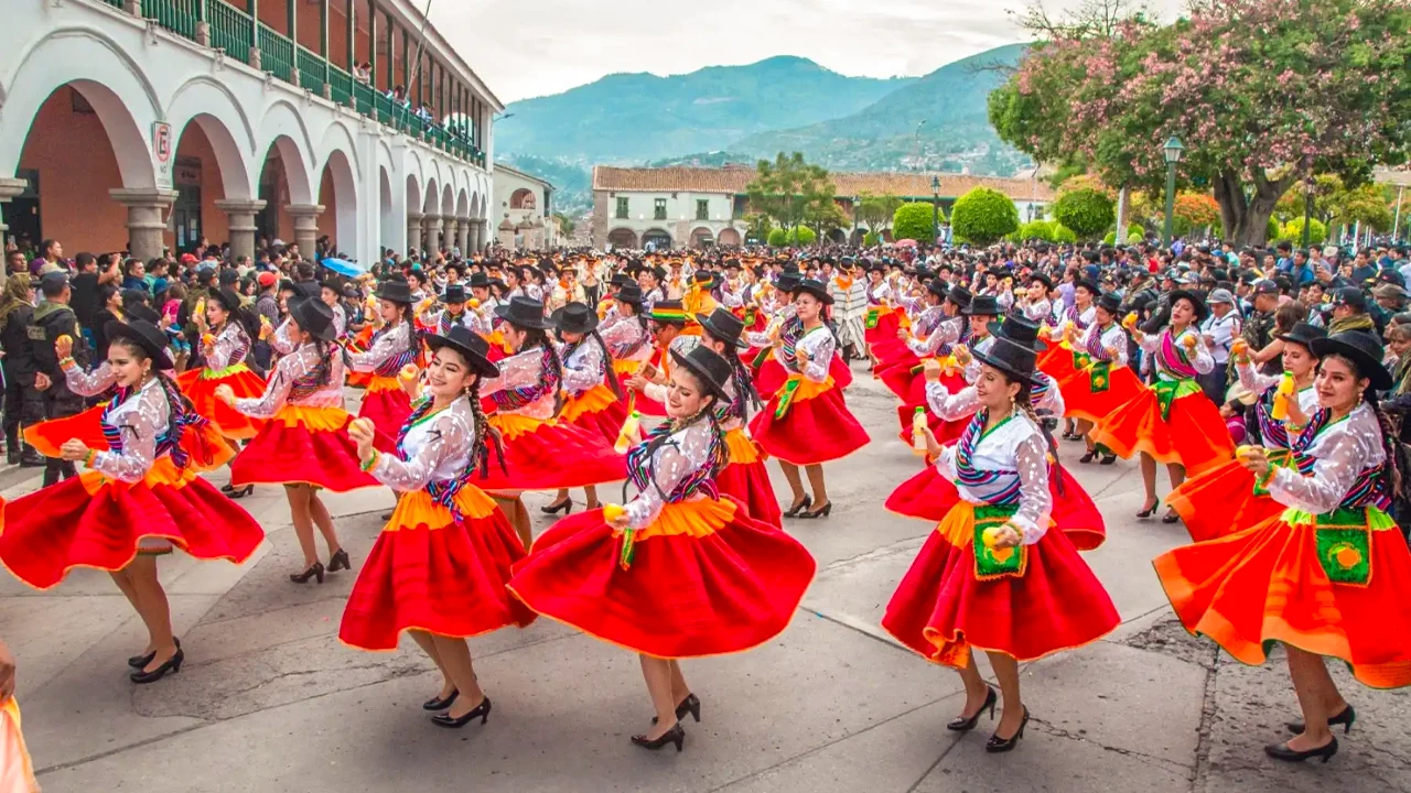 Dance groups and tourists during the 2026 Ayacucho Carnival in Peru